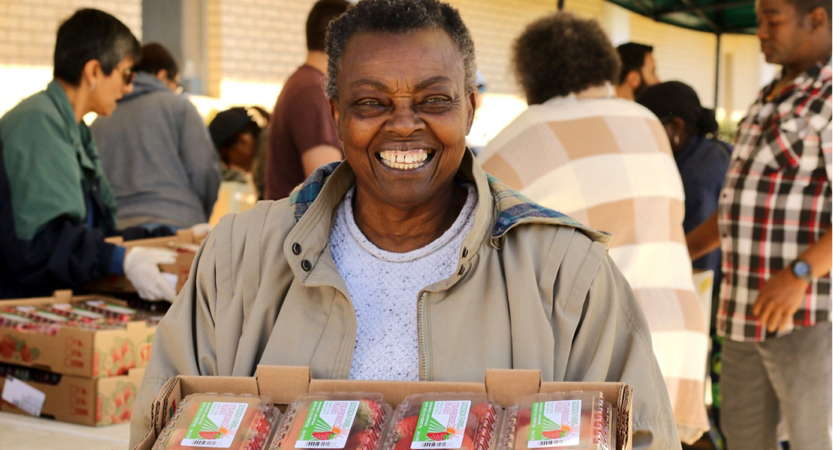 A volunteer sorting donations