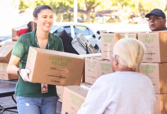Staff hand out food to clients