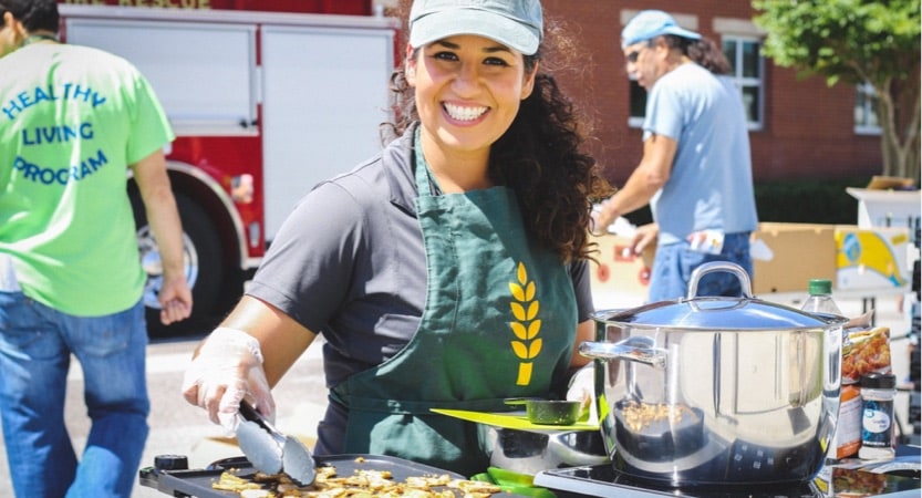 Feeding tampa bay staff smiles for a picture