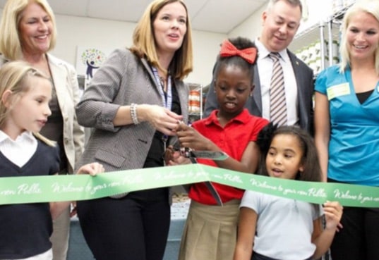 Ribbon cutting at feeding minds school pantry