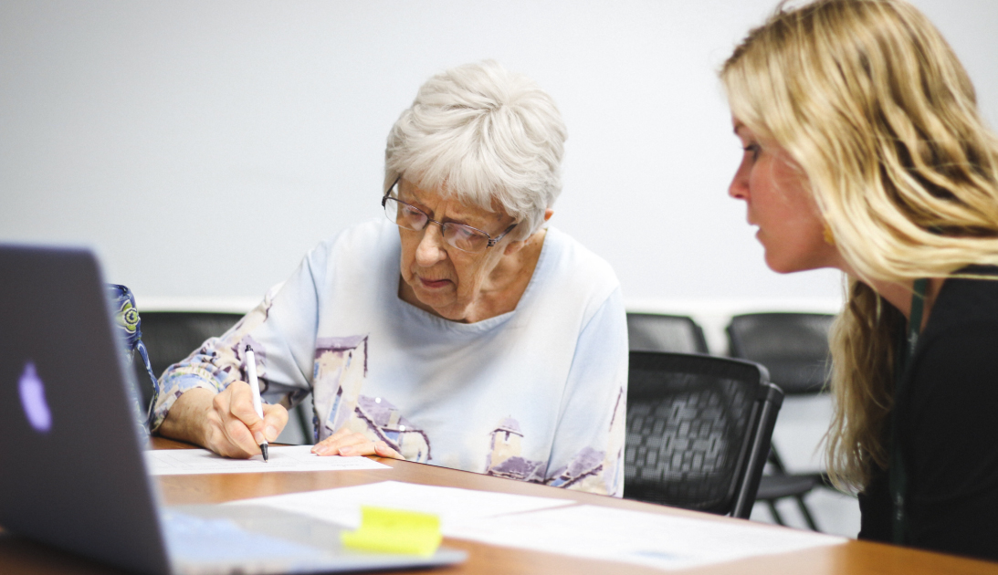 Feeding tampa bay staff helps a client with a SNAP application