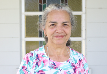 Woman smiles for a picture