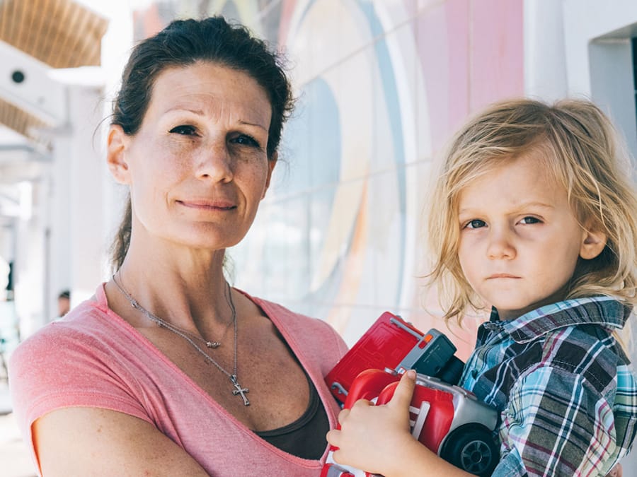 DeAdra holding her young son