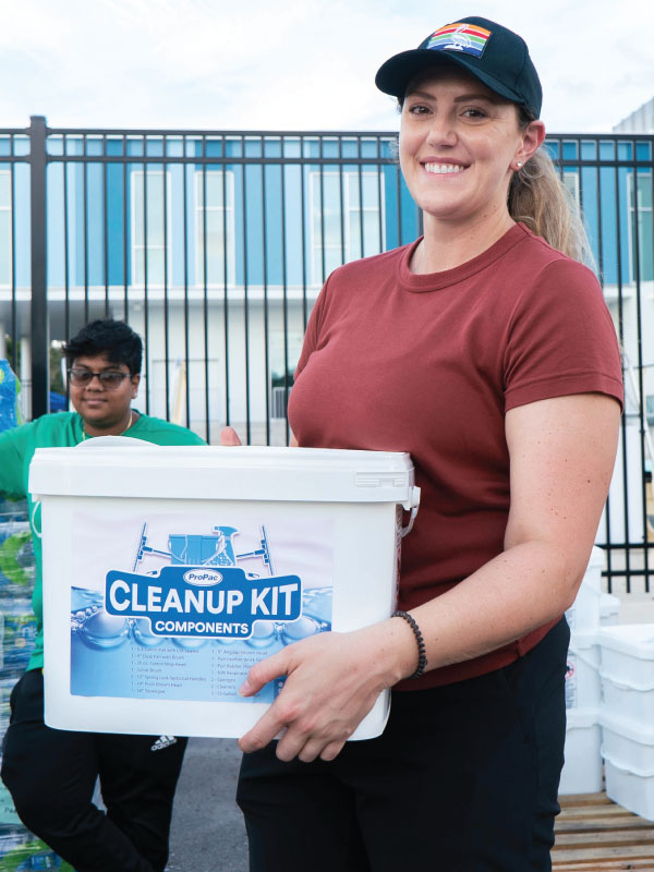 Volunteer with hurricane supplies